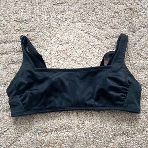 women’s black swim top
